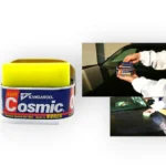 Applying Cosmic Polish on car surface for protection