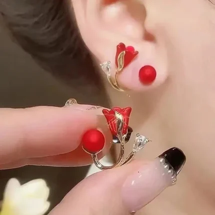 Text:** Stylish red rose stud earrings for girls – lightweight and trendy ear tops
