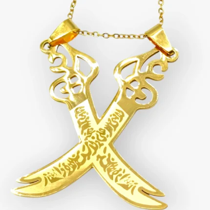 Close-up of Zulfiqar sword pendant with Arabic calligraphy in Islamic jewelry design